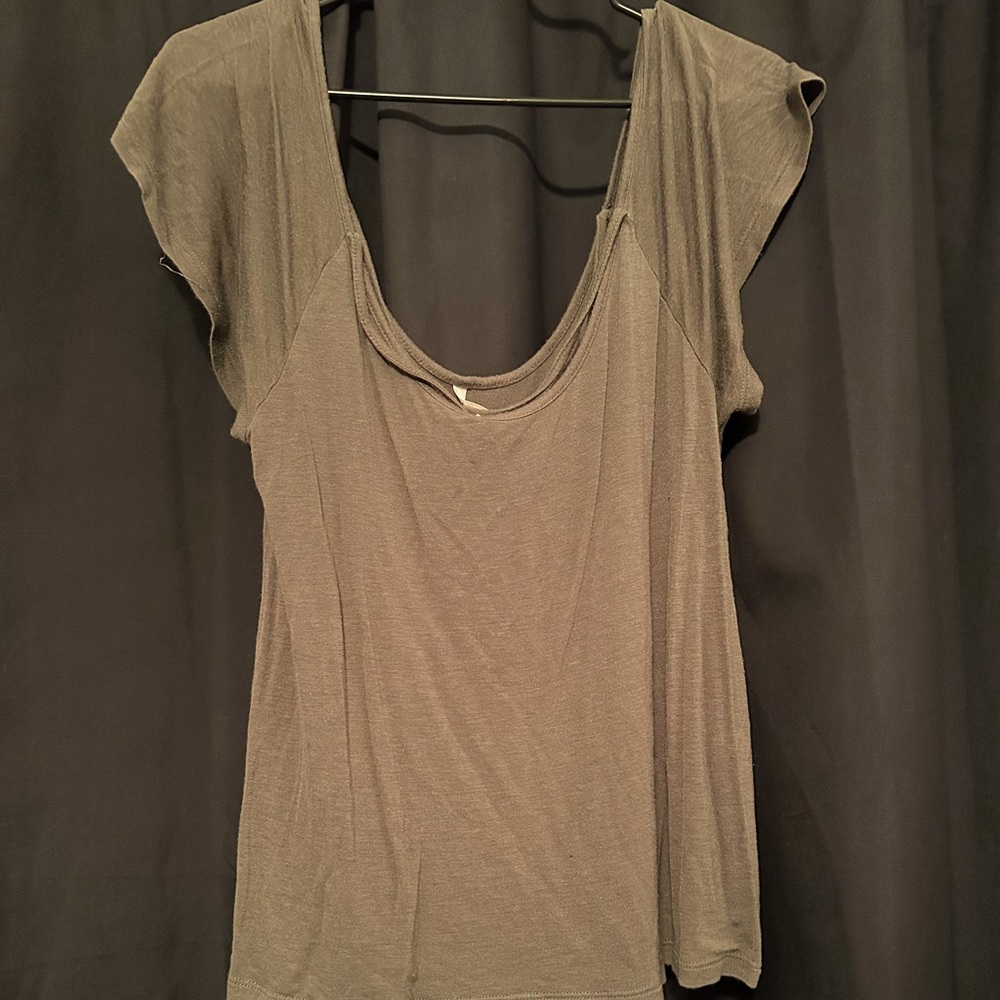 Forest green top with straps across the back